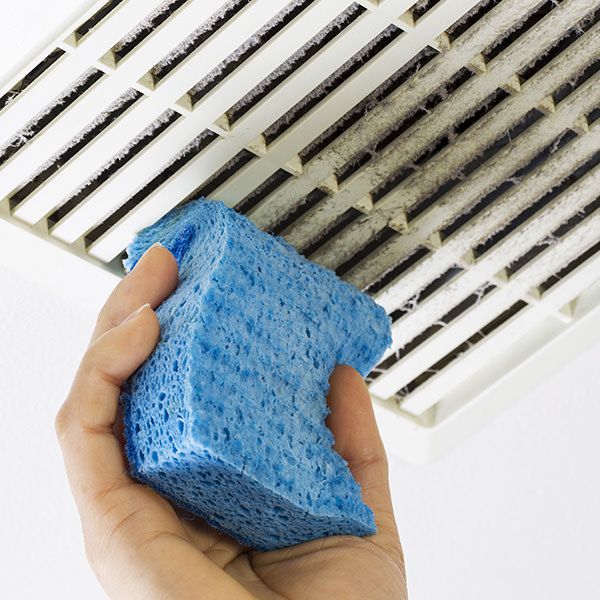clean a bathroom extractor fan