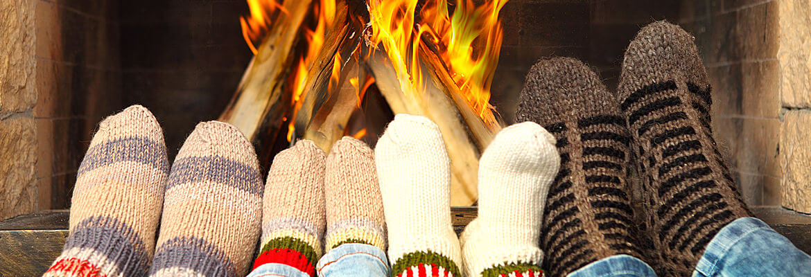 The warmth emanating from a fireplace