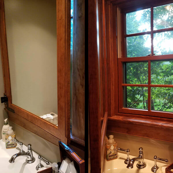 A Window behind the Bathroom Mirror